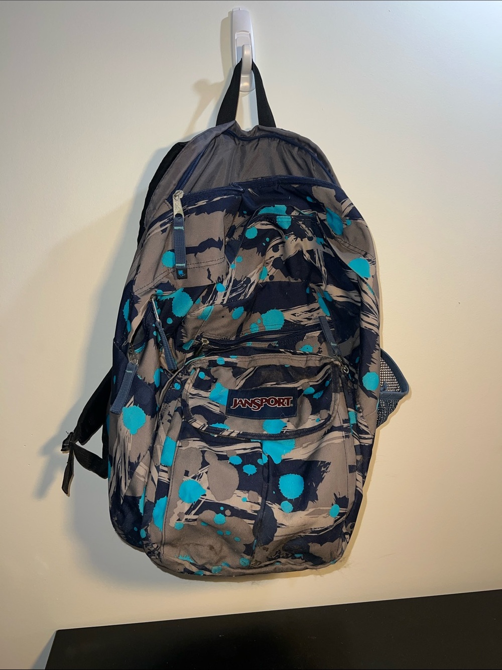 Jansport Gray Backpack with Teal Paint-Splash Pattern